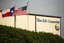 Flags flutter in the breeze outside of Blue Bell Creameries on Thursday, April 23, 2015, in Brenham, Texas. Blue Bell issued its first recall in the company's 108-year history earlier in the week after its products were linked to Listeria cases in four states. (Smiley N. Pool/Dallas Morning News/TNS)